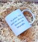 Preview: Handgefertigte weiße Tasse mit dem Schriftzug 'In jedem Bild steckt ein Stück des Herzens des Fotografen'. Präsentiert in einer dekorativen Holzwolle-Verpackung.
