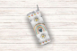 Preview: Einzelner Boho-Tumbler mit bunten Regenbogen-, Blumen-, Herz- und Sternmotiven auf einem cremefarbenen Hintergrund, liegend auf einer rustikalen Holzoberfläche. Stilvolles Design für trendige Trinkliebhaber.