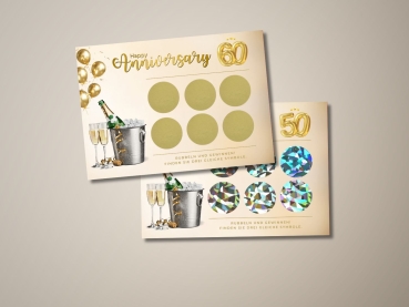 Zwei personalisierte Jubiläums-Rubbellose mit Champagner-Illustration. Die obere Karte zeigt „Happy Anniversary“ mit goldener 60 und sechs goldenen Rubbelfeldern. Die untere Karte zum 50. Jubiläum hat holografische Rubbelsticker in funkelndem Design.