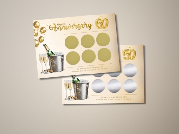 Zwei personalisierte Rubbellose zum Jubiläum oder Geburtstag. Die obere Karte zeigt „Happy Anniversary“ mit goldener Zahl 60 und sechs goldenen Rubbelfeldern. Die untere Karte zeigt die Zahl 50 mit silbernen Rubbelfeldern. Beide Karten sind mit Champagner