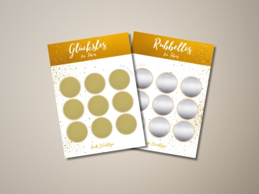 Preview: Personalisierte Rubbellos-Karte mit Namen – Glückslos mit 9 Rubbelfeldern als Geschenkidee Preview: Zwei personalisierte Rubbelkarten mit dem Namen „Tobias“ im gold-weißen Design mit 9 Rubbelfeldern. Die linke Karte zeigt goldene Rubbelsticker, die rechte silberne. Oben steht „Glückslos“ bzw. „Rubbellos“, unten der Hinweis „Finde 3 gleiche“.