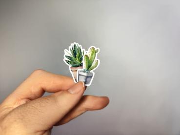 Dekorativer Sukkulenten- und Kaktus-Sticker, handgefertigt im Aquarellstil – in der Hand gehalten